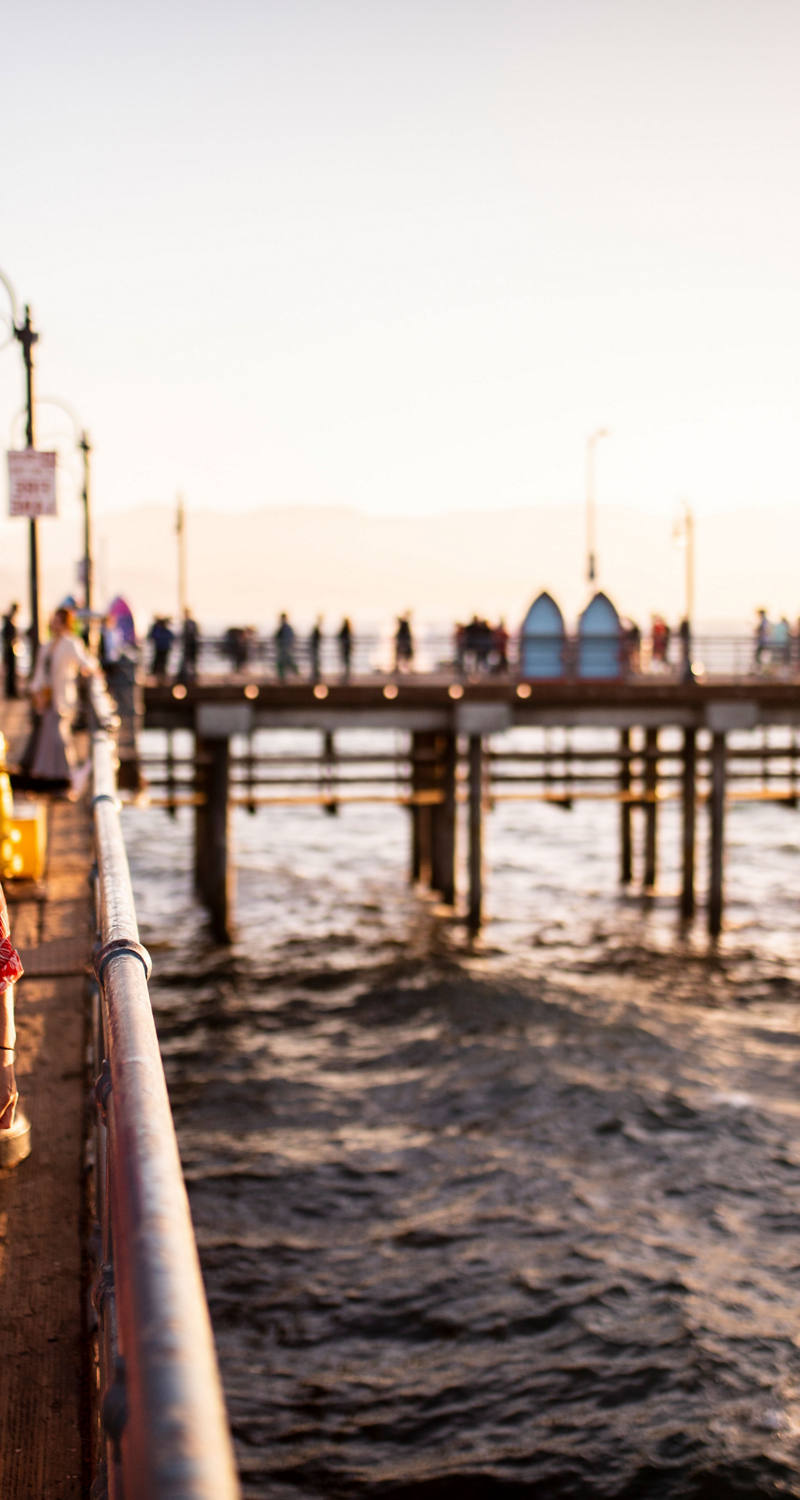 Woman strolling along the pier.