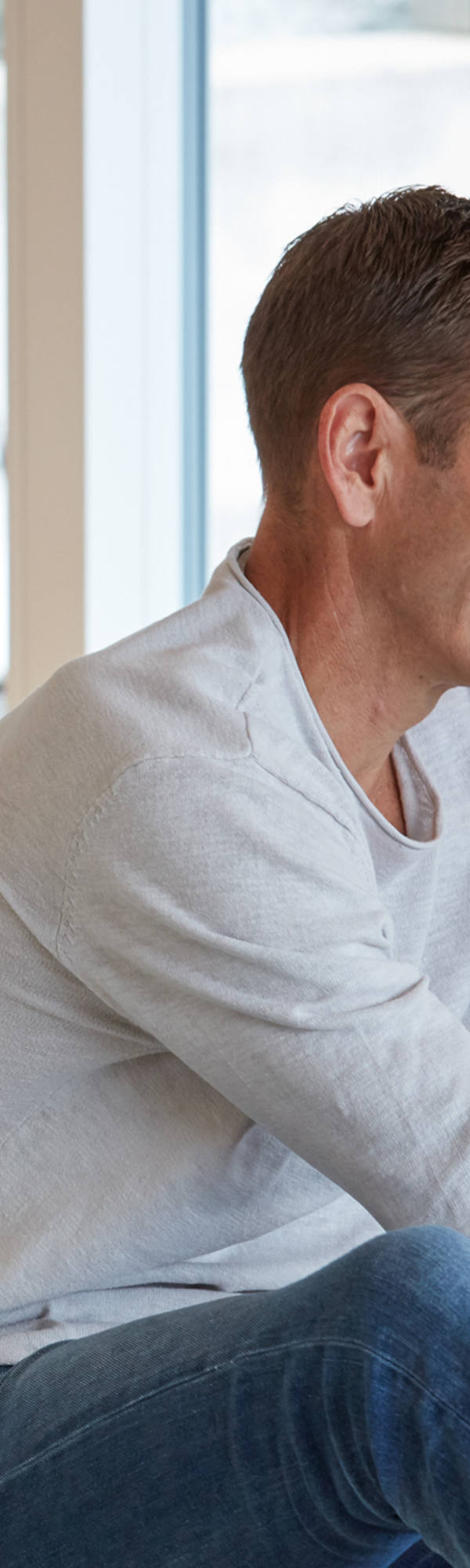 Happy man on the sofa.