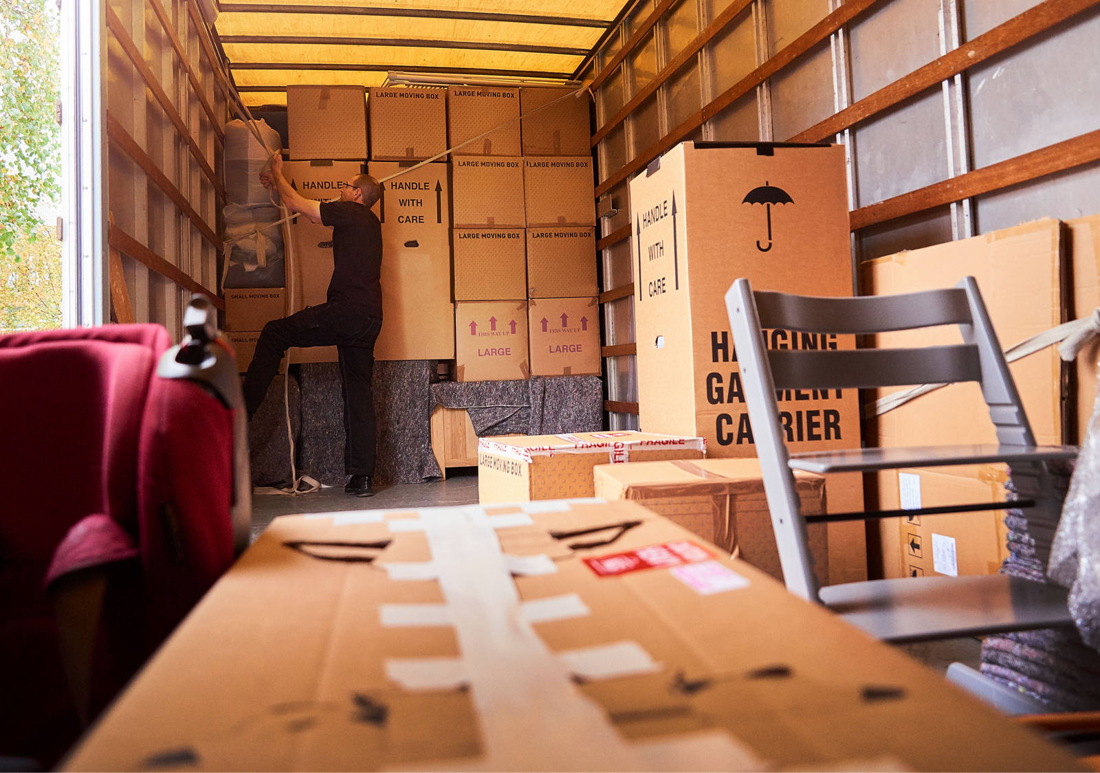 Moving truck filled with reins crates